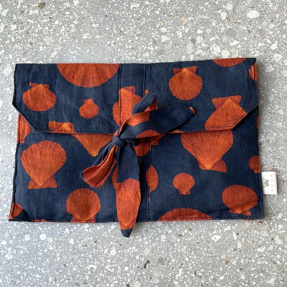 Agua by Agua Bendita linen shell clutch